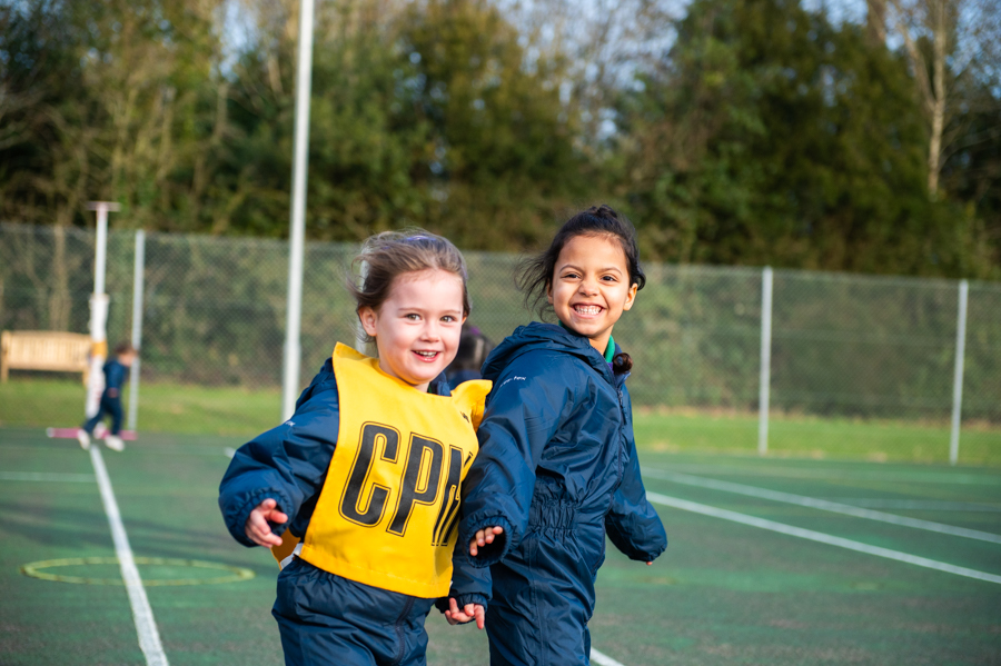 Two girls outdoors at Maltman’s Green all-girls private school.